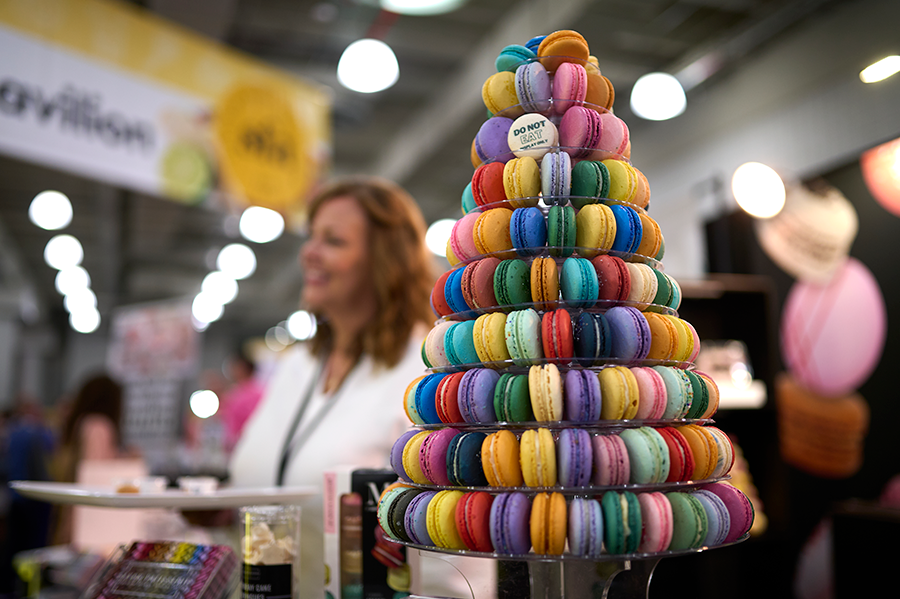 Tower of macarons at a Member Booth at the Fancy Food Show