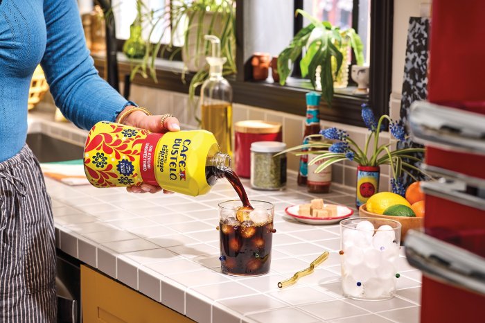 Person pouring cafe bustelo coffee